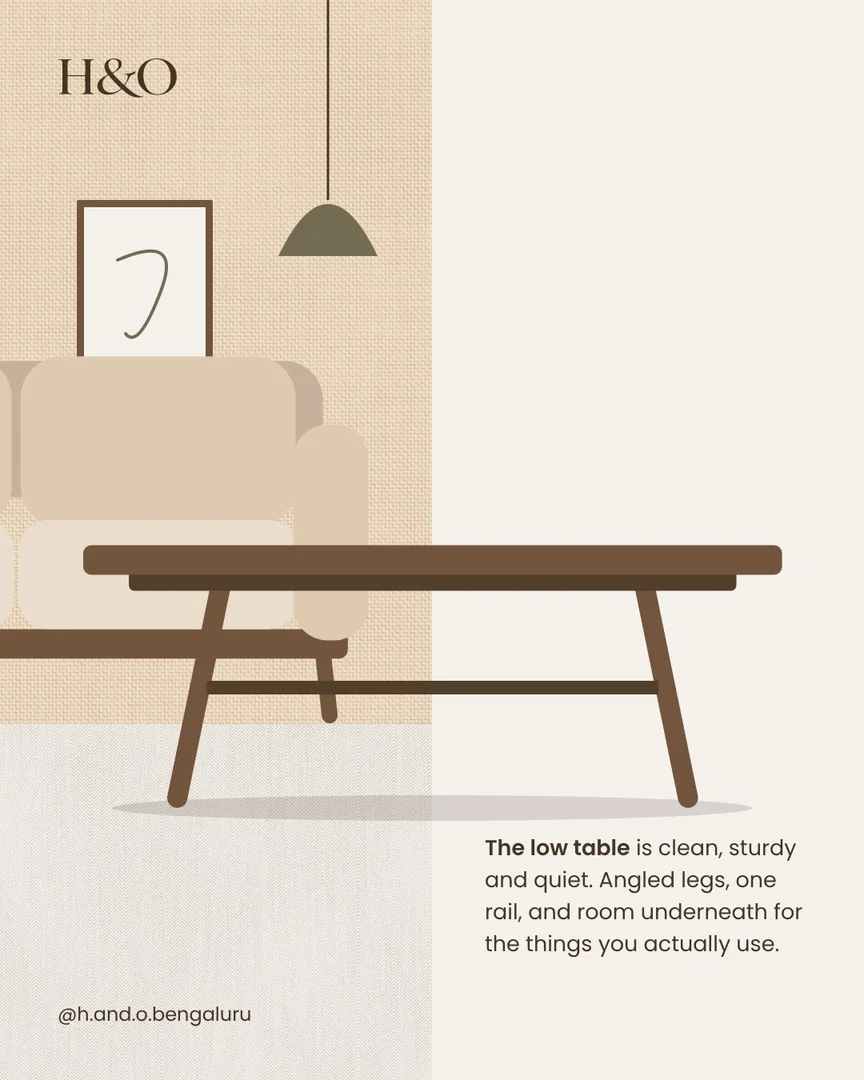 A low table drawn across a split: a room on one side, plain cream on the other